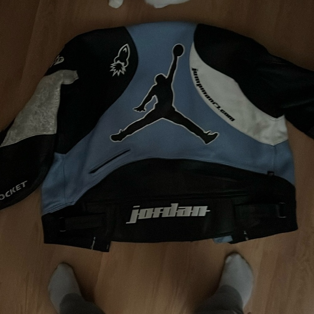I’m selling a biker Jordan leather coat. Mint condition. Varsity blue